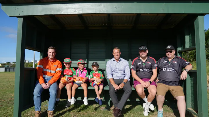 L-R: BMD Communications Graduate Ethan Malt, three junior players, BMD Executive General Manager of Constructions Jeff Gallus, Wynnum Manly Juniors Coaching Director Mick Haggarty and Wynnum Manly Juniors Coach Danny Eaton. 