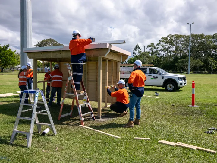 BMD graduates building the dugouts at the Wynnum Manly Juniors Club.  