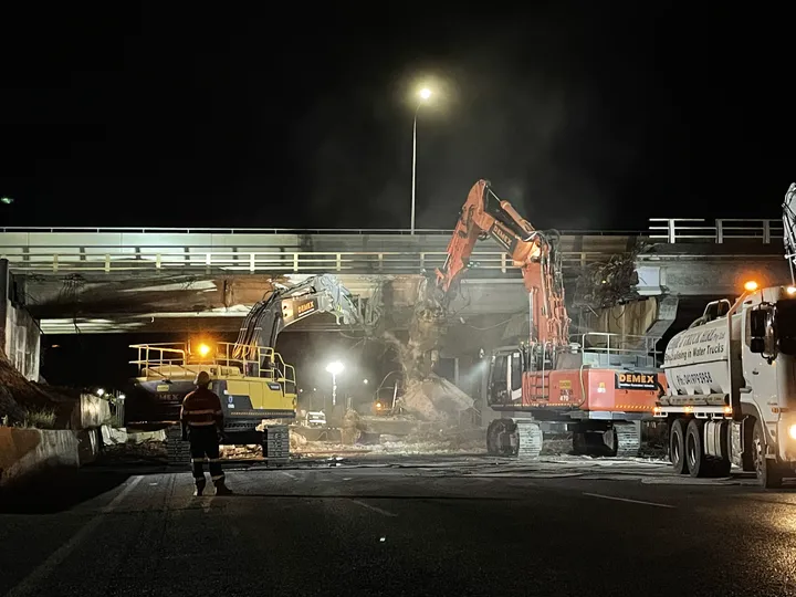 Demolition of the old bridge to make way for construction of the second bridge across the Bruce Highway, Bruce Highway Upgrade – Deception Bay Road interchange project